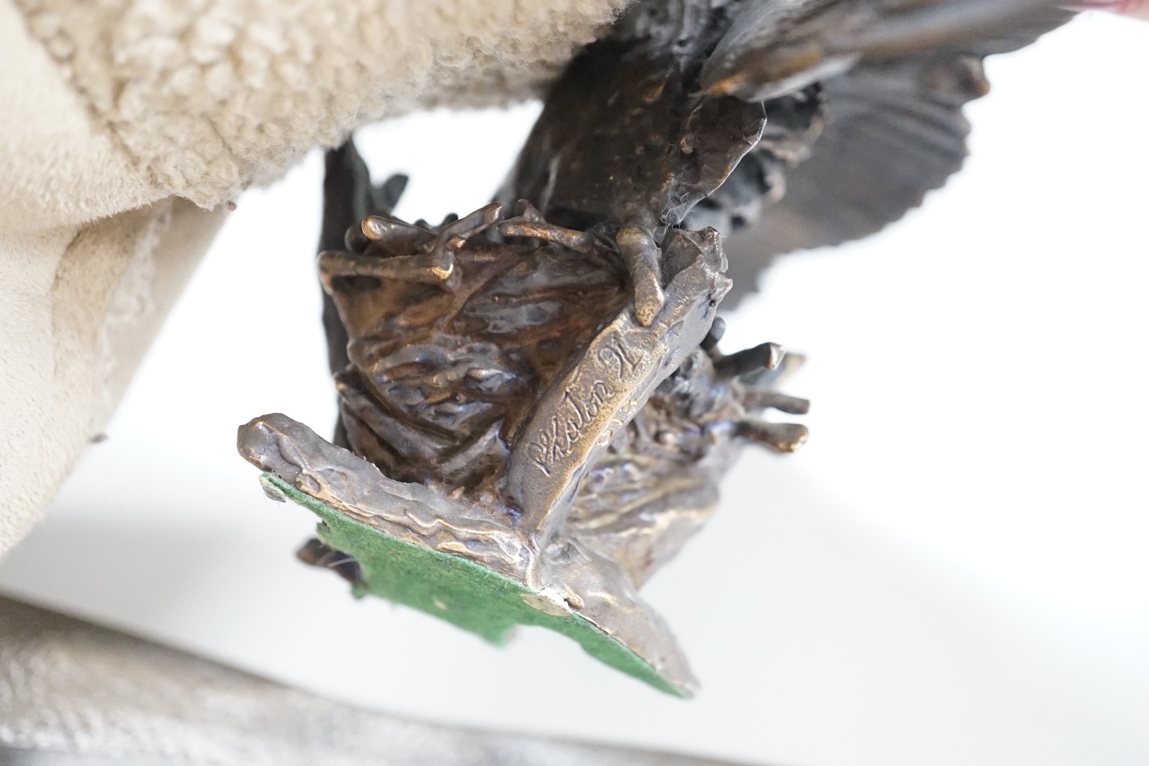 Paul Eaton - a limited edition bronze owl, signed and dated ‘91. Numbered 013, wingspan 24.5cm
